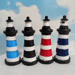 Close-up detail of miniature resin lighthouses, perfect for aquarium and desktop decoration.