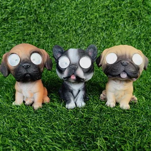 Outdoor solar garden pug figurines light set, resin animal lawn decoration for yard patio.