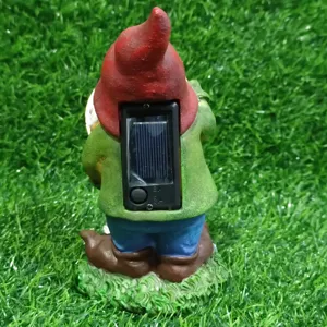 Back detail view of the solar garden gnome showing the built-in solar panel and switch.