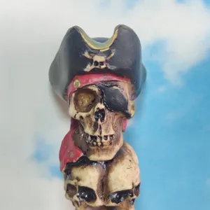 Detailed close-up of a creative resin pirate skull figurine, perfect for Halloween home decor.