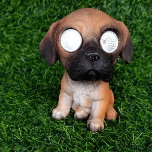 Detailed close-up of cute puppy solar garden light, resin animal figurine for outdoor lawn.