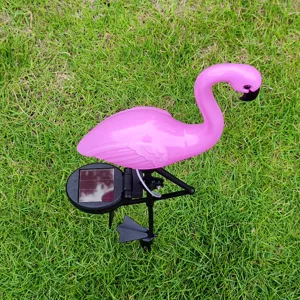 Outdoor solar flamingo garden light detail, bright pink waterproof lawn stake decor.
