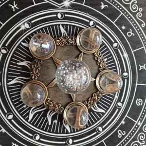 Resin pentagram altar tray with clear crystal glass spheres, mystic tabletop decor display.