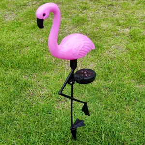 Solar flamingo garden light detail view, pink lawn stake decoration with LED and panel.