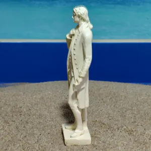 Close-up detail of Thomas Jefferson statue figurine, white resin model for sandtray therapy.