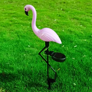 Solar flamingo garden light detail view, pink waterproof LED lawn stake for outdoor yard decor.