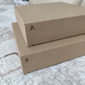Kraft paper packaging boxes set, brown carton display, blank cardboard storage box.