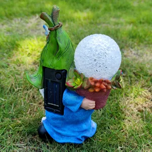 Solar resin gnome garden light back view showing solar panel and switch detail for outdoor decor.