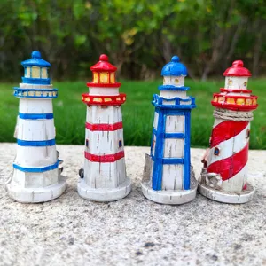 Detailed view of Mediterranean resin lighthouse miniatures for aquarium and home decor.