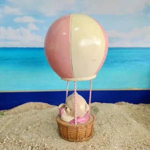 Mini hot air balloon bear figurine, cute resin sandplay toy accessory for psychology sandbox games.