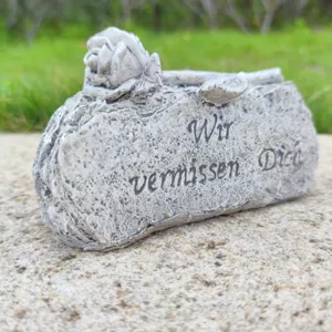 Memorial grave stone ornament with rose sculpture and German condolence text for garden decor.