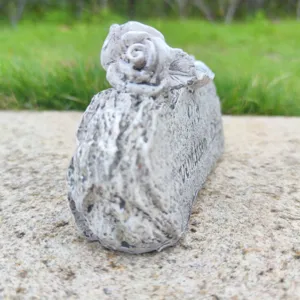 Detailed view of resin memorial grave marker with rose decor, European style prop.