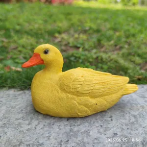 Cute yellow duck resin figurine desktop ornament and garden sculpture for home decor.