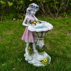 Resin fairy garden ornament featuring bird feeder detail for outdoor lawn and yard decor.