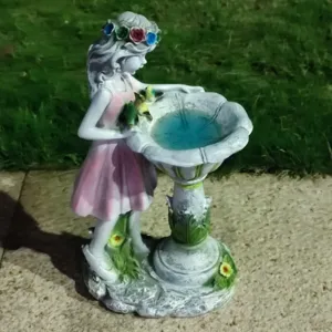Resin fairy garden solar light statue detail, cute outdoor yard lawn decoration ornament view.