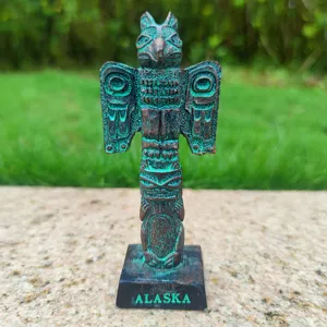 Resin totem pole figurine detail, vintage bronze finish, perfect for sandbox decor.
