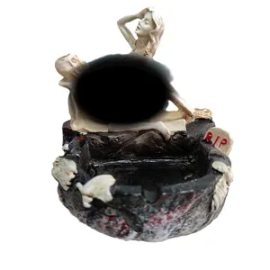 Halloween gothic resin ashtray skull and skeleton woman sculpture spooky home decor tabletop.