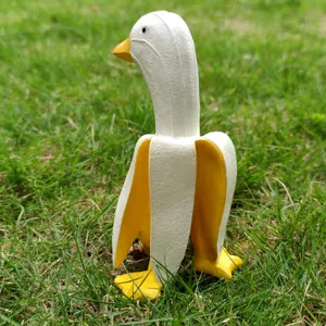 Creative banana duck figurine cute resin animal sculpture for home garden desktop decor