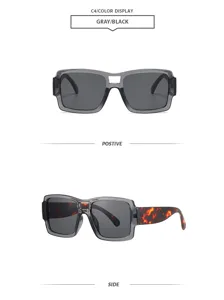 Vue détaillée de lunettes de soleil tendance à double pont, monture grise et branches écaille.