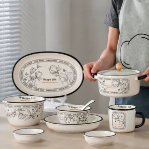 Ceramic tableware set with soup pot, bowls, and plates, featuring floral prints for home.