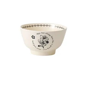 Retro keramische rijstkom met zwart bloemmotief, elegant servies voor thuisgebruik.