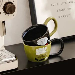 Vintage ceramic coffee mug with big handle and unique floral design, stylish breakfast cup.