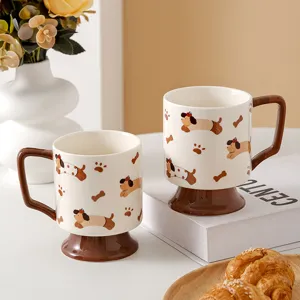 Ceramic coffee mug with cute puppy print, brown high base and handle, aesthetic desktop detail view.