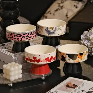 Ceramic high foot bowl set with various patterns for home decor, snack display, or fruit storage.