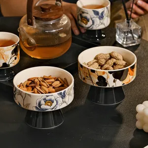 Ceramic high-foot fruit bowl, elegant floral snack dish for living room coffee table.