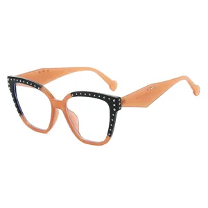 Gafas de vista geométricas vintage de ojo de gato con bloque de color y remaches.