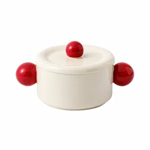 Ceramic soup bowl detail with red ball handles and lid, 1000ml capacity, elegant style.