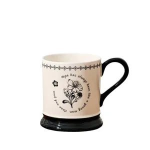 Vintage ceramic coffee mug with retro floral design, elegant office water cup for daily use.