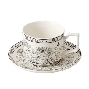 Juego de taza y plato de café de cerámica vintage francesa con diseño floral.