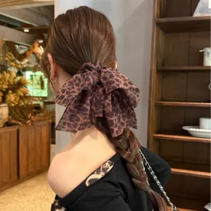 Coletero de pelo con lazo de leopardo retro para mujer, elegante accesorio de gasa.