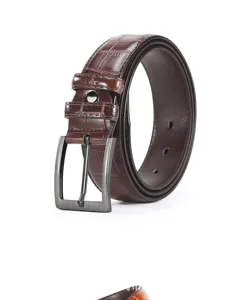 Men's brown crocodile pattern leather belt alloy pin buckle detail close up view.
