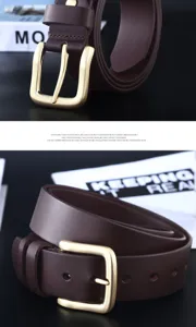 Detailed view of brown men's leather belt with classic metal pin buckle and quality texture.