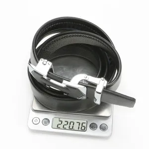 Close-up detail of the black leather mens belt showing texture and silver automatic buckle.