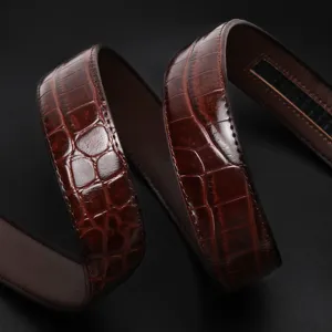 Men's brown crocodile pattern leather belt, high-end business casual belt accessory.
