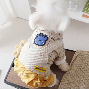 Cute plaid dog shirt overalls with cute blue bear patch, warm winter pet apparel.