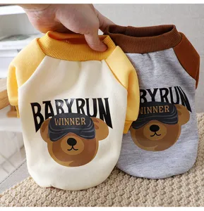 Cute bear pattern pet fleece sweater, warm color-block winter cat dog clothes detail.