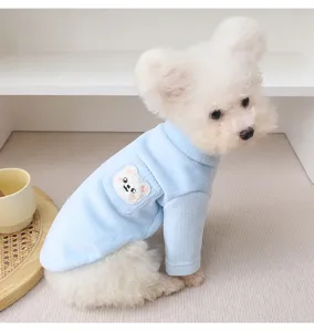 Detailed view of the light blue pet fleece turtleneck vest with cute bear patch for small dogs.