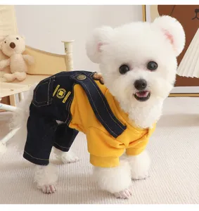 Cute dog autumn winter hoodie set detail view showing yellow sweatshirt and denim overalls for puppies.