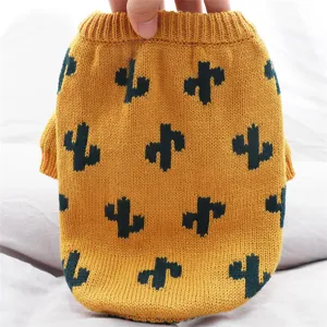 Detailed view of a yellow knitted pet sweater with cute green cactus patterns for small dogs.