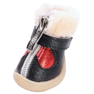 Warm winter pet dog shoes with plush lining anti-slip rubber sole and zipper closure.