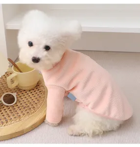 Detailed view of the pink ribbed pet sweater, warm high neck design for small dogs.