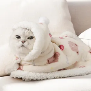 Cozy winter cat cloak featuring cute strawberry and bear pattern, soft warm pet blanket.