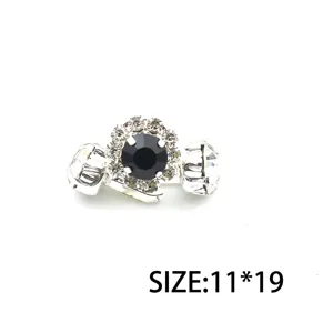 Exquisite DIY rhinestone shoe buckle with brass base and black center stone for stylish footwear.