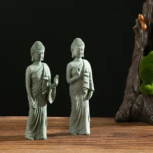 Green sandstone standing Zen Buddha statue ornament for home living room decor display.