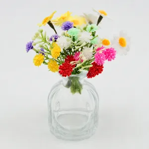 Colorful artificial flower bouquet with glass vase for DIY decor, weddings, and craft projects.