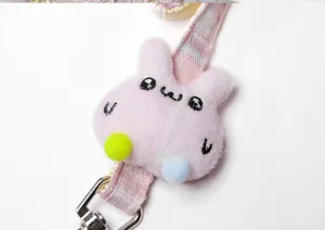 Pink plush rabbit pet leash detail, cute cartoon design with soft and comfortable material.